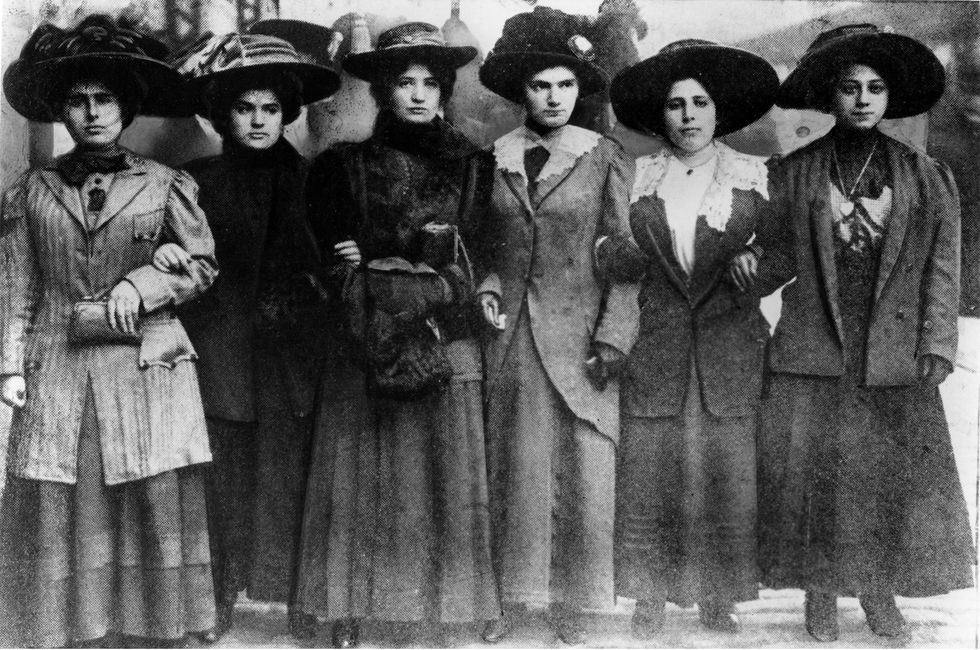 black and white photo of six 19th century women