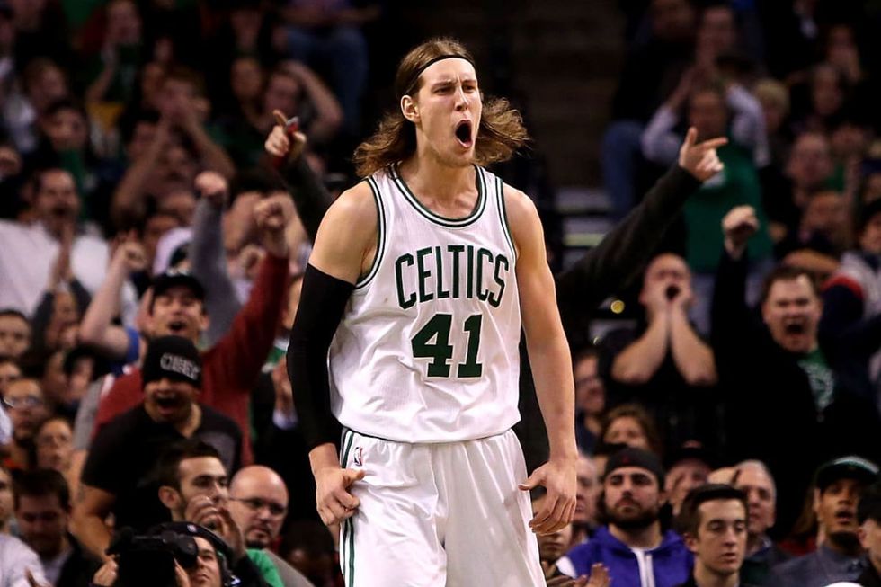 BOSTON, MA - NOVEMBER 14: Kelly Olynyk #41 of the Boston Celtics celebrates after a play in the second half against the Cleveland Cavaliers at TD Garden on November 14, 2014 in Boston, Massachusetts. (Photo by Mike Lawrie/Getty Images)
