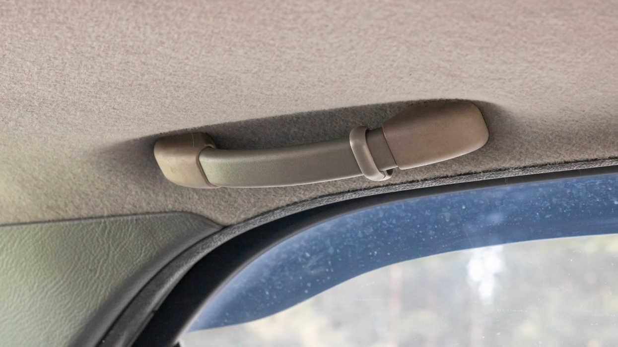 car grab handle, oh shit handle, viral tweet, driving humor, Taylor Myers, car interior features, funny driving memes, passenger anxiety