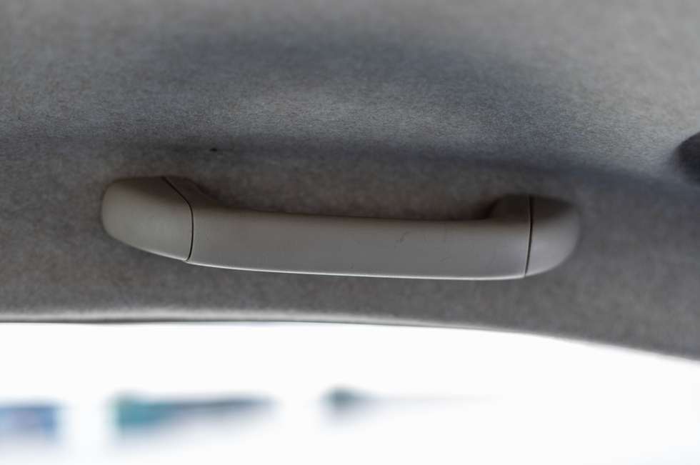 car grab handle, oh shit handle, viral tweet, driving humor, Taylor Myers, car interior features, funny driving memes, passenger anxiety