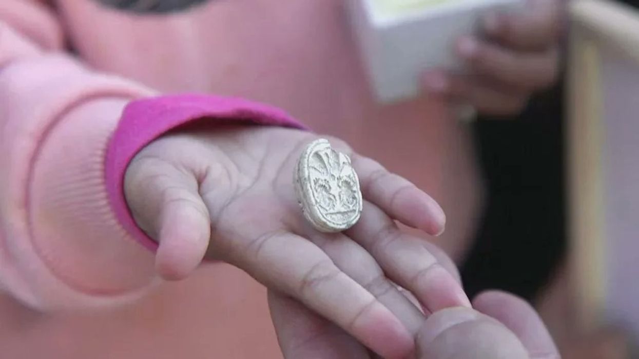 child, hand, amulet, discovery, scarab, Egypt, artifact