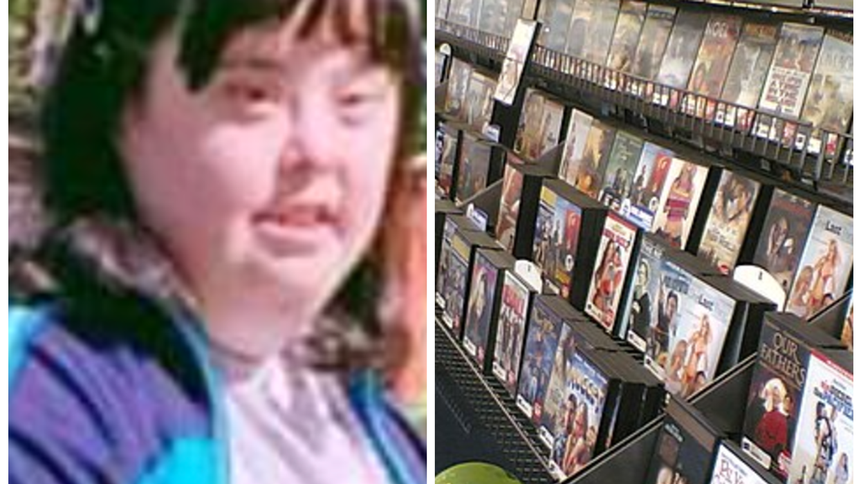 Christina Cavanaugh next to video store wall