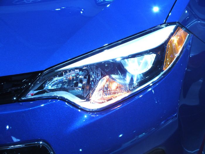 close up of a car's headlight