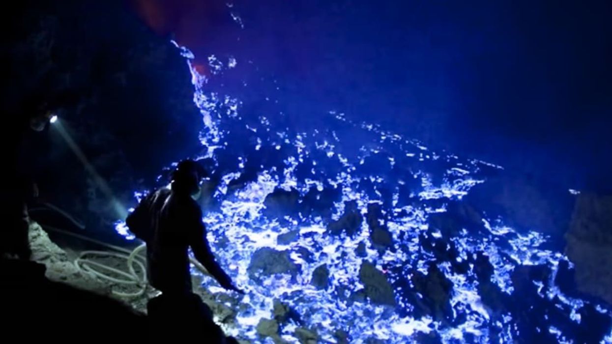 Mind-blowing clip shows man visiting a strange volcano with blue lava and the visuals are stunning