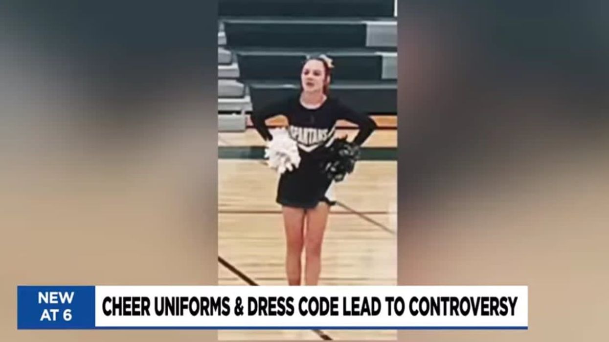 Mom stands up for her daughter after school told her to 'cover up' while wearing her cheerleading outfit