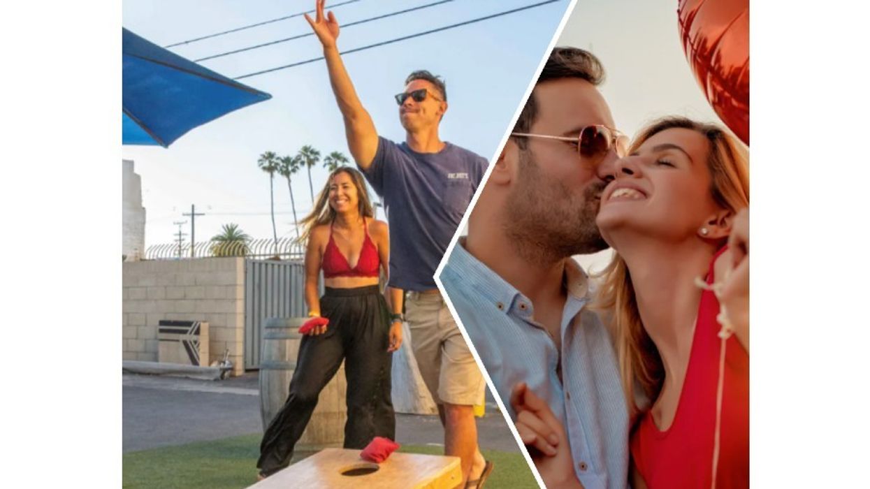 folks playing cornhole and kissing