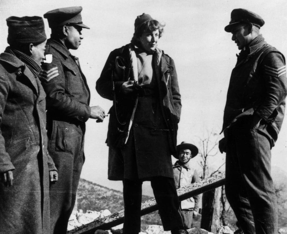 Image Source: 1944: Journalist and writer Martha Gellhorn talks to Indian soldiers of the British Army on the 5th Army's Cassino front. (Photo by Keystone/Getty Images)