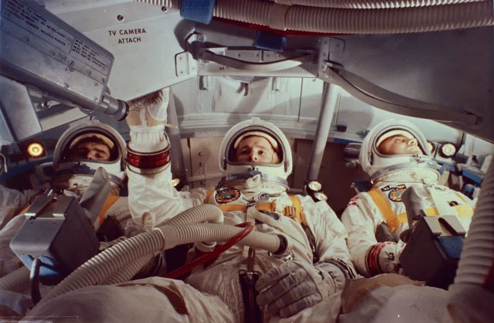 Image Source: 1967: Virgil I Grissom, Edward White and Roger Chaffee inside a practice module for the aborted Apollo 1 mission at Cape Kennedy, Florida.  (Photo by MPI/Getty Images)