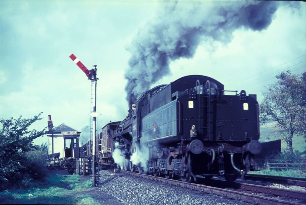 Image Source: A British Railway's Standard 4 Class 4-6-0, one of several allocated to Tebay for banking duties, on the 1 in 75 climb up Shap Fell. Scout Green signal box is in the background. Wednesday 27th September 1967. (Photo by Rail Photo/Construction Photography/Avalon/Getty Images)