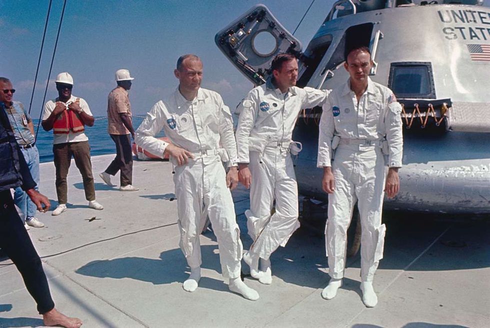 Image Source: Apollo 11 astronauts (L to R): Buzz Aldrin, Lunar Module Pilot; Neil Armstrong, Lunar Module Cmdr.; and Michael Collins, Command Module Pilot| Location: Space Center, Houston, Texas, USA.