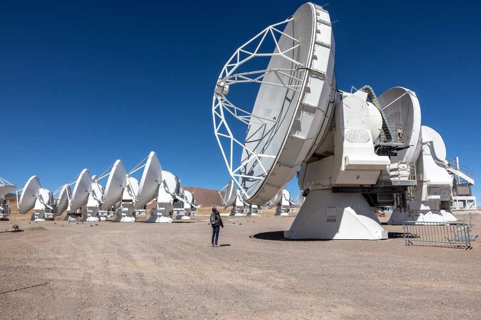 Image Source: Atacama Large Millimeter/submillimeter Array (ALMA) radio telescope on August 26, 2022 on the Chajnantor Plateau in northern Chile. (Photo by John Moore/Getty Images)