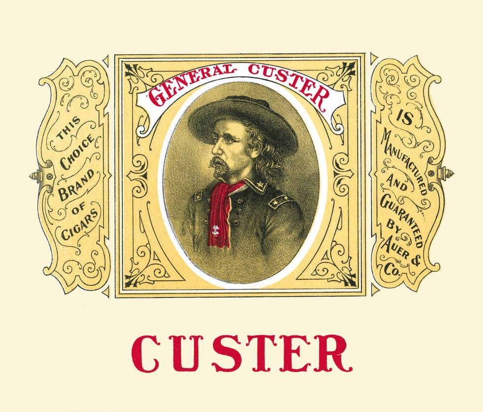 Image Source: Cigar box label reads 'Custer' and features an illustration of General George Armstrong Custer, late 19th or early 20th century. (Photo by Buyenlarge/Getty Images)