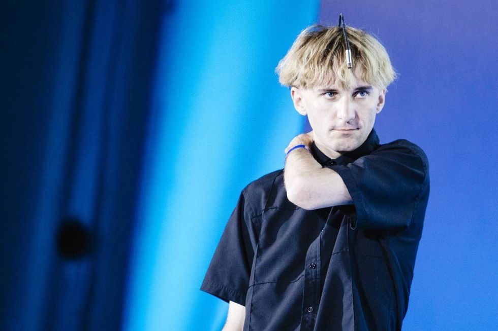 Image Source:  Contemporary artist and cyborg activist Neil Harbisson best known for having an antenna implanted in his skull and for being officially recognised as a cyborg by a government attends Campus Party on July 21, 2017 in Milan, Italy. (Photo by Rosdiana Ciaravolo/Getty Images)