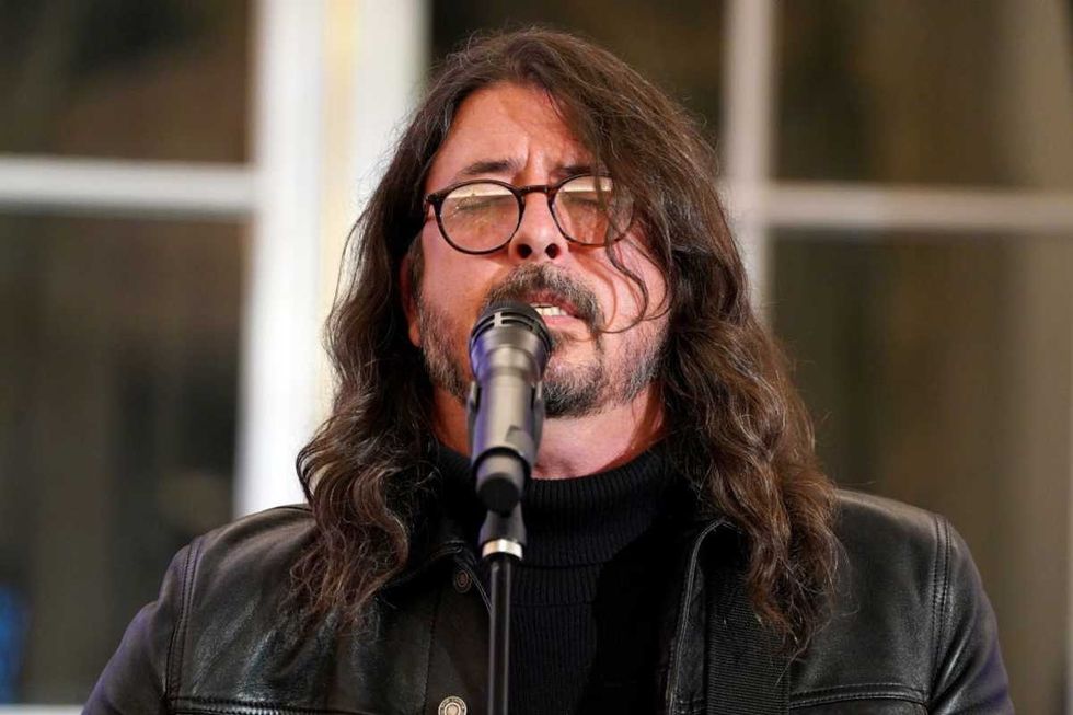 Image Source: Dave Grohl performs onstage during the launch of the Global Music Diplomacy Initiative at the U.S. Department of State on September 27, 2023 in Washington, DC. (Photo by Leigh Vogel/Getty Images for The Recording Academy)