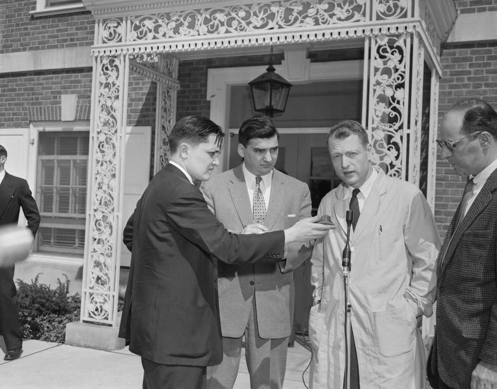 Image Source: Dr. Thomas Harvey, Chief Pathologist at the Princeton Hospital tells reporters outside the hospital how he performed the autopsy on Dr. Albert Einstein.