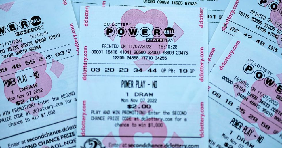 Image Source : In this photo illustration, tickets for the upcoming Powerball lottery are seen on November 07, 2022 in Washington, DC. (Photo illustration by Tasos Katopodis/Getty Images)
