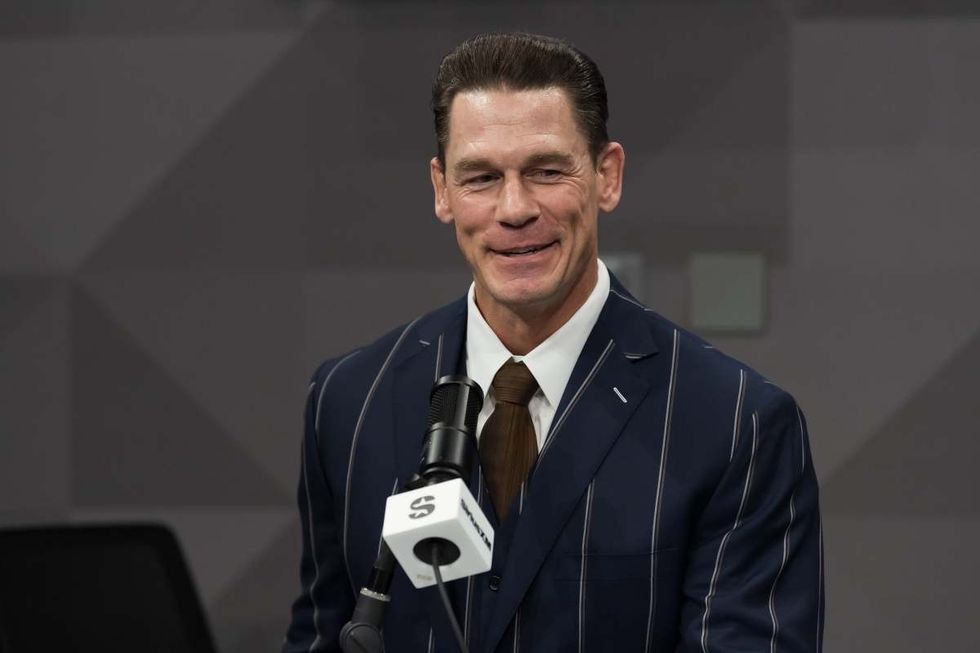 Image Source: John Cena visits SiriusXM Studios on February 21, 2024 in Miami Beach, Florida. (Photo by Jason Koerner/Getty Images)