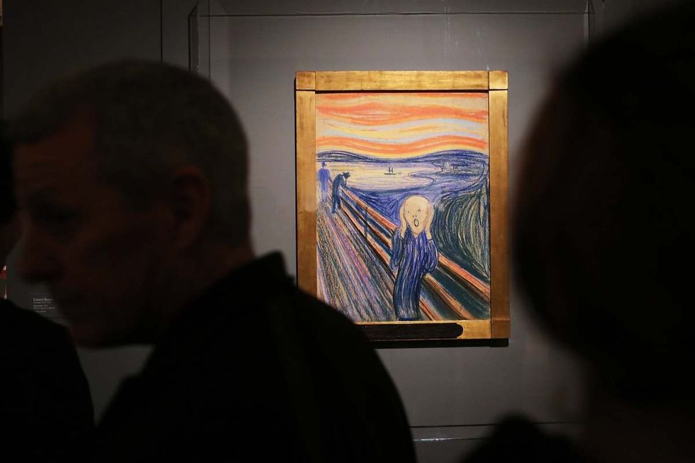 Image Source: People look at Edvard Munch's