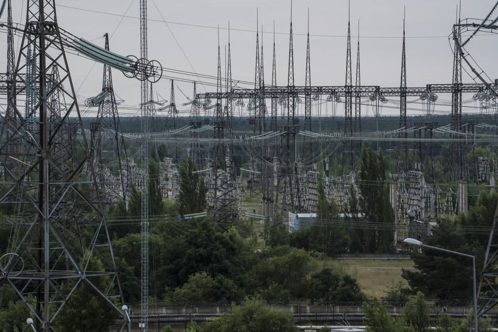 Image Source: Power lines at the Chernobyl Nuclear Power Plant on July 2, 2019 in Pripyat, Ukraine (Photo by Brendan Hoffman/Getty Images)