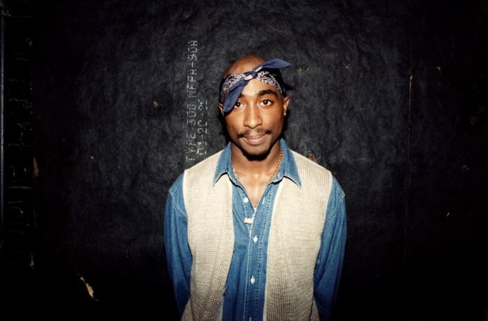 Image Source: Rapper Tupac Shakur poses for photos backstage after his performance at the Regal Theater in Chicago, Illinois in March 1994. (Photo By Raymond Boyd/Getty Images)