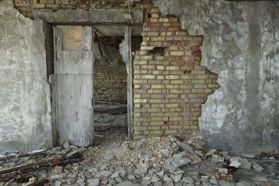 Image Source: Rooms in an abandoned hotel decay in the ghost town of Pripyat not far from the Chernobyl nuclear power plant on August 18, 2017 in Pripyat, Ukraine. (Photo by Sean Gallup/Getty Images)