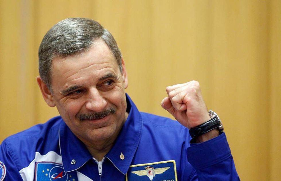 Image Source: Russian cosmonaut Mikhail Kornienko attends to a press conference with US astronaut Scott Kelly at the UNESCO on December 18, 2014 in Paris, France. (Photo by Chesnot/Getty Images)