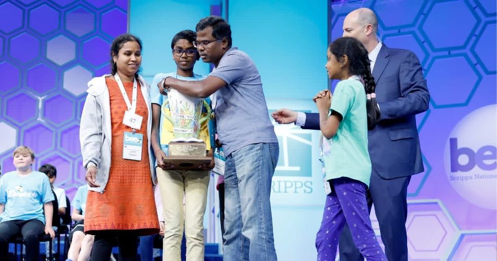 Image Source: Twelve-year-old Bruhat Soma, of Tampa, Florida, is hugged by his family after winning the 2024 Scripps National Spelling Bee at the Gaylord National Resort and Convention Center on May 30, 2024 in National Harbor, Maryland. (Photo by Anna Moneymaker/Getty Images)