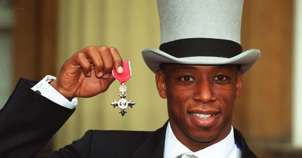 Image Source : West Ham Utd FC and England International Footballer Ian Wright, Mbe Outside Buckingham Palace after receiving the MBE. (Photo by Avalon/Getty Images)