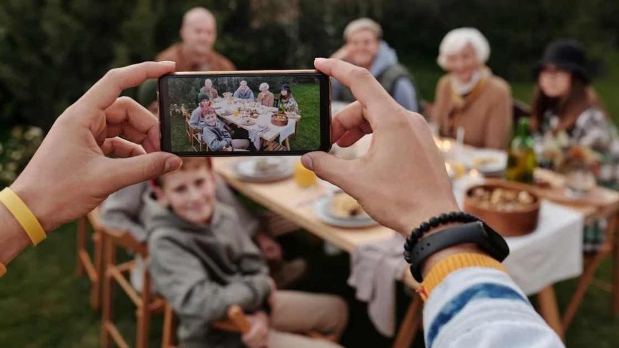 Woman pulls off 'cheesy family photo' prank after mom and stepdad exclude her from holiday card