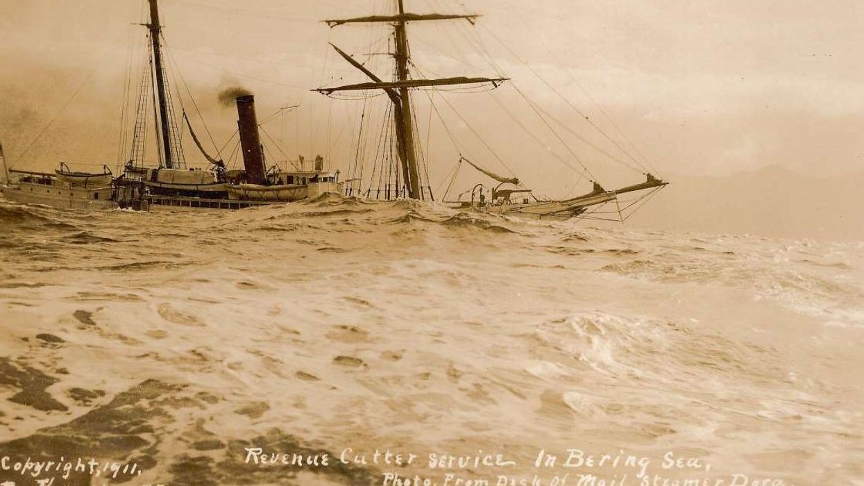 Thrilling footage shows snowstorm erupting in the middle of the rolling Bering Sea waves