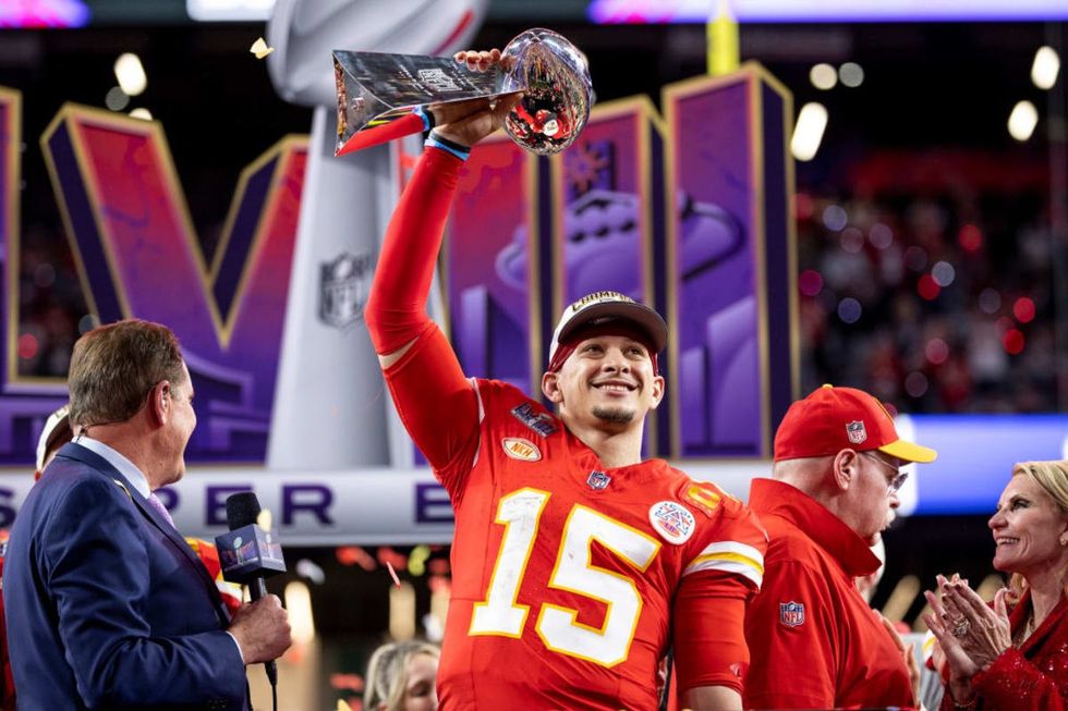 LAS VEGAS, NEVADA - FEBRUARY 11: Patrick Mahomes #15 of the Kansas City Chiefs celebrates with the Vince Lombardi Trophy following the NFL Super Bowl 58 football game between the San Francisco 49ers and the Kansas City Chiefs at Allegiant Stadium on February 11, 2024 in Las Vegas, Nevada. (Photo by Michael Owens/Getty Images)
