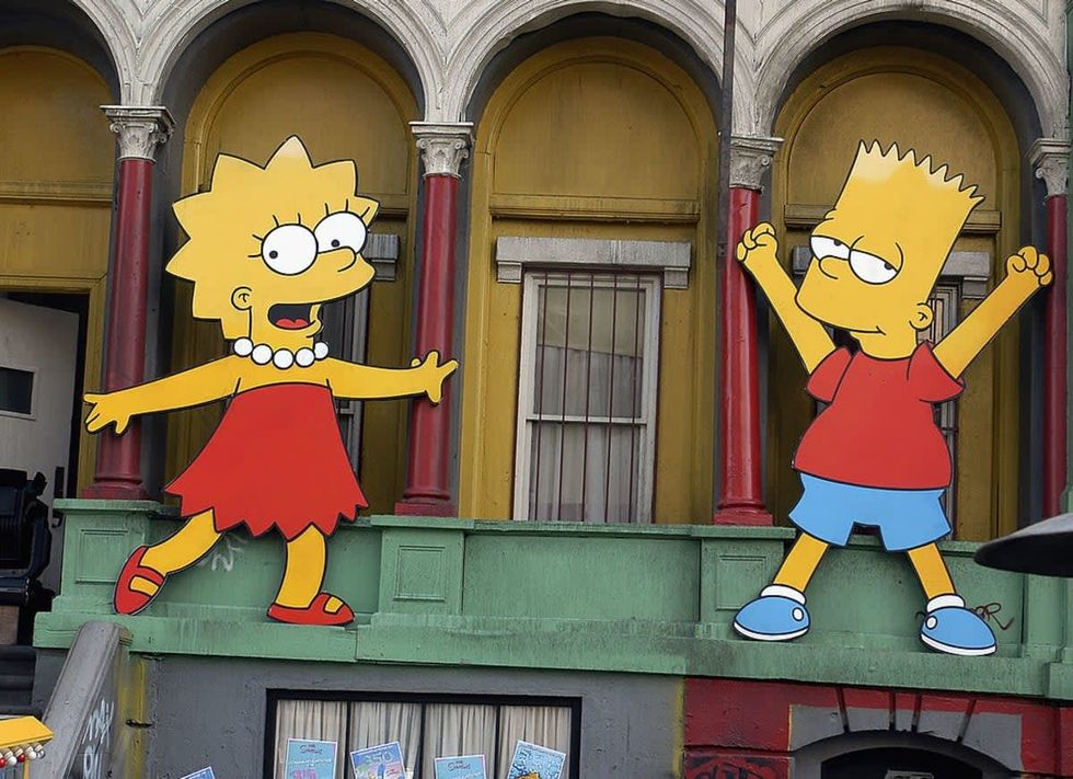 LOS ANGELES, CA - APRIL 25: Lisa Simpson and Bart Simpson cut-outs on display at