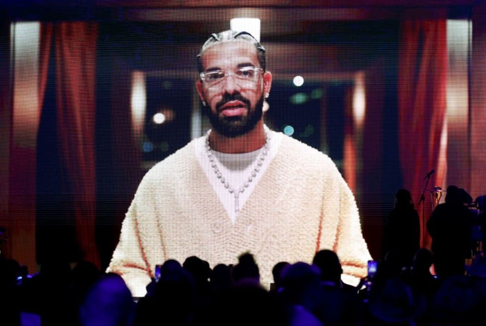LOS ANGELES, CALIFORNIA - FEBRUARY 02: Drake appears via video during the Recording Academy Honors presented by The Black Music Collective during the 65th GRAMMY Awards on February 02, 2023 in Los Angeles, California. (Photo by Maury Phillips/Getty Images for The Recording Academy)
