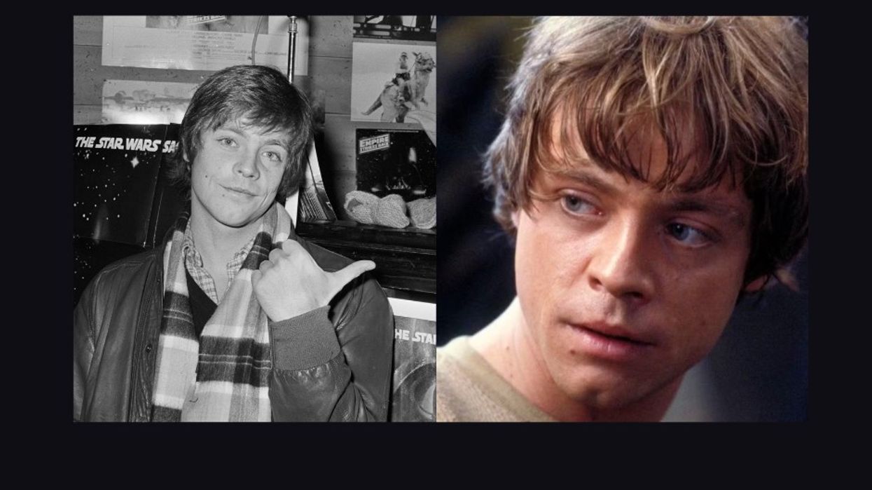 Mark Hamill points to an image of his Luke Skywalker character