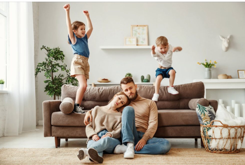 Parents, kids, family, jumping on sofa, rambunctious