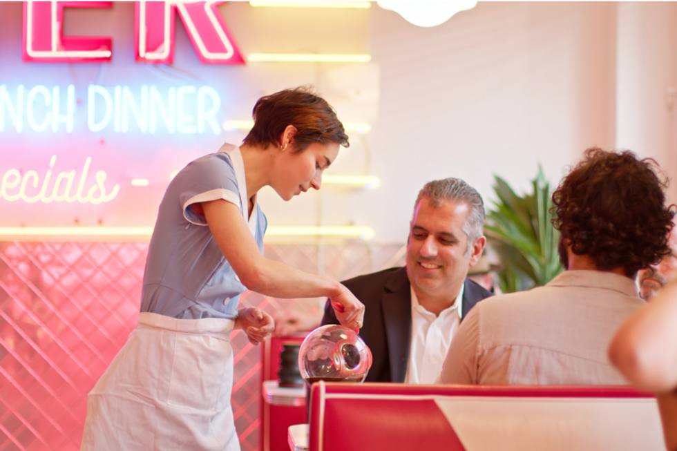 People eating at a diner