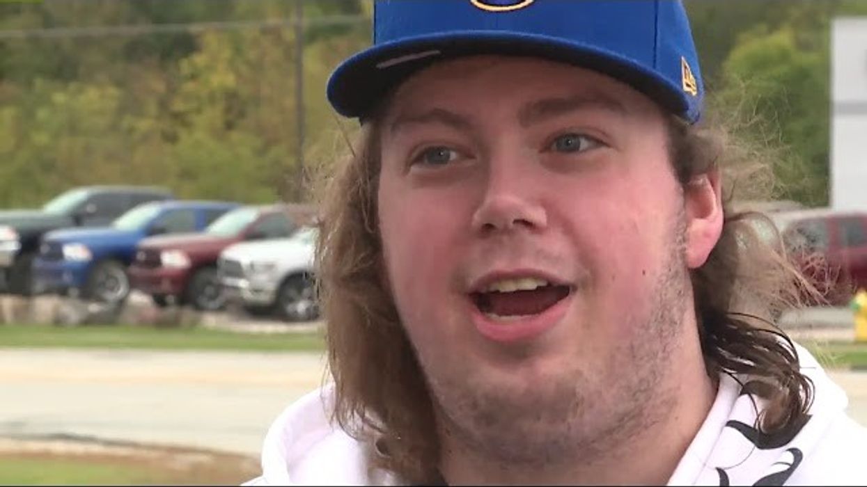 Pizza delivery driver Joey Grundl speaks in an interview