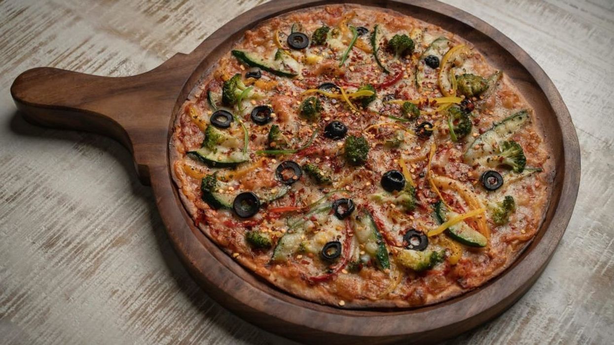 Restaurant's kind response to heartbroken customer's strange pizza request is winning hearts online