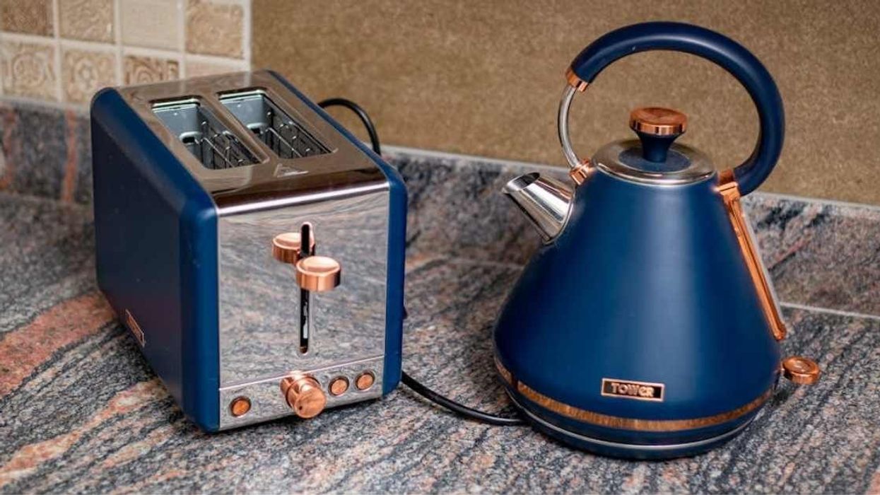 Friends failing to control laughter while arranging funeral for 'favorite kitchen appliance' is epic