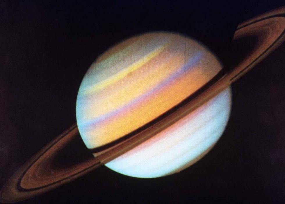Representative Image Source: 0-28-80 Washington: Image of Saturn taken by the Voyager Spacecraft at a distance of 21.1 million miles. Color enhanced by NASA.UPI COLOR PHOTO