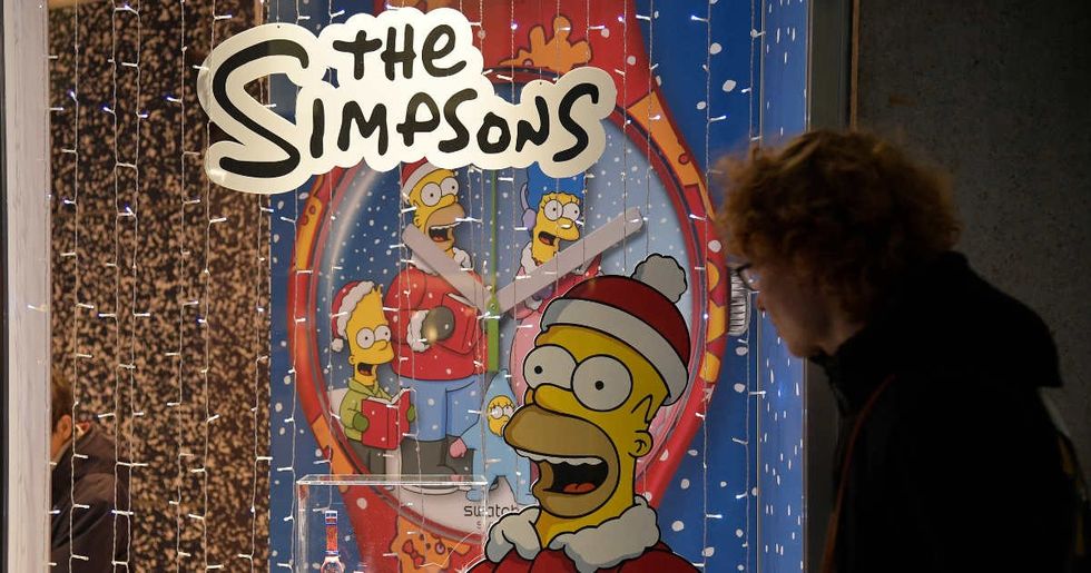 Representative Image Source: A person looks at The Simpsons display at Swatch during the holiday shopping season on December 13, 2023 in Turin, Italy. (Photo by Stefano Guidi/Getty Images)