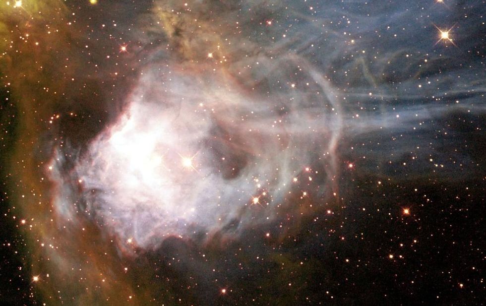 Representative Image Source: A region of ionized hydrogen gas in the Large Magellanic Cloud (LMC), a nearby, small companion galaxy to the Milky Way. (Photo by NASA/WireImage)