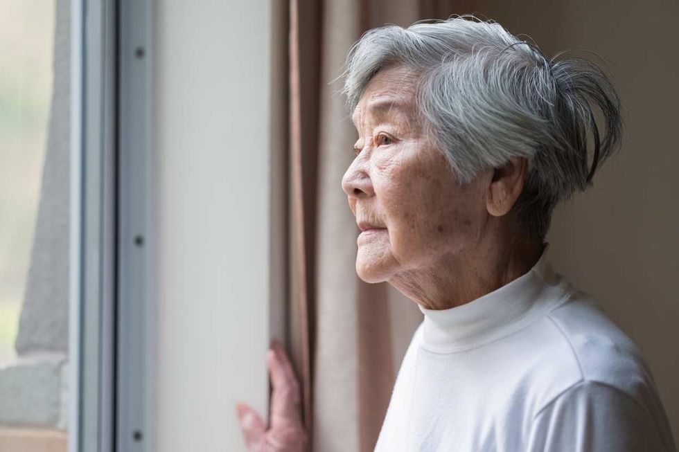 Representative Image Source: Chinese senior woman looking outside. (Photo by Pamela Jo McFarlane for Getty Images)
