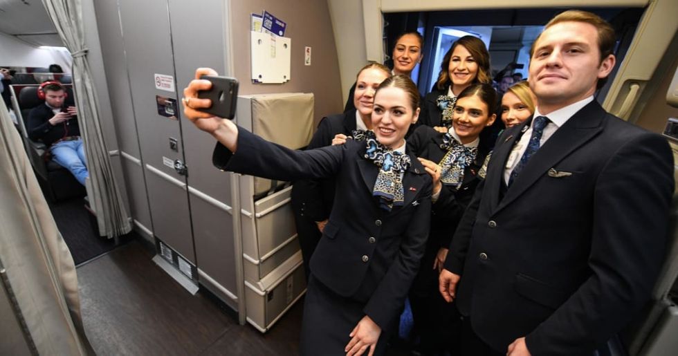 Representative Image Source: Crew of last flight of Turkish Airlines plane from Ataturk airport takes a selfie in the cabin on April 06, 2019 in Istanbul, Turkey. Ataturk Airport was opened in 1953 and was the first international airport in Istanbul. (Photo by Burak Kara/Getty Images)