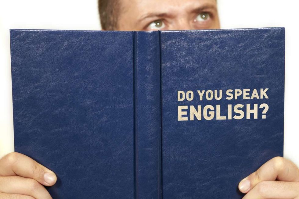 Representative Image Source: Do you speak English. Man read a book. (Getty Images)