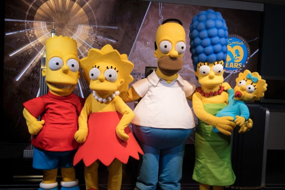 Representative Image Source: (L-R) Bart Simpson, Lisa Simpson, Homer Simpson, Marge Simpson and Maggie Simpson visit The Empire State Building to celebrate the 30th anniversary of