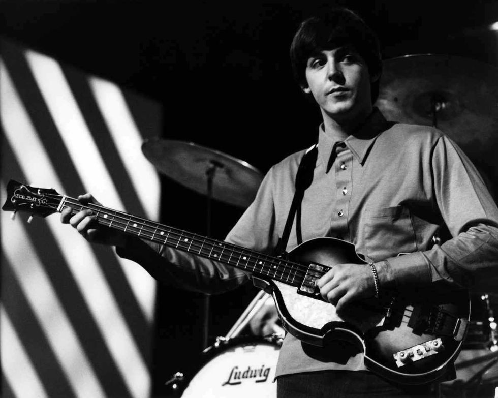 Representative Image Source: Paul McCartney of The Beatles plays his violin bass guitar on stage during rehearsals for an ABC Television music television show. (Photo by David Redfern/Redferns)