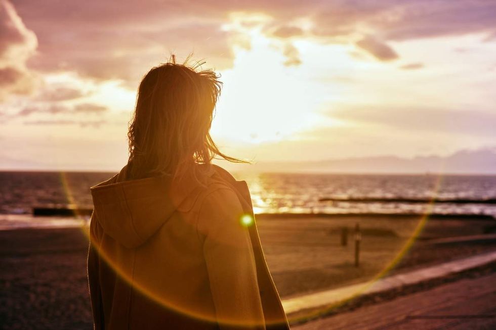 Representative Image Source: Portrait of young woman on beach (Getty Images)