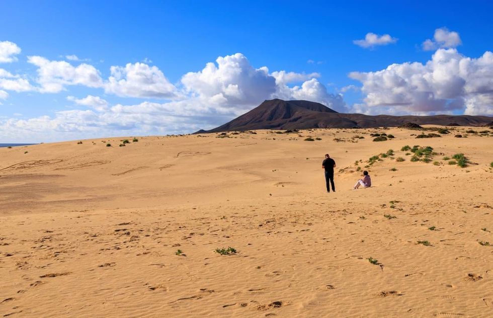 Representative Image Source: Scenery at Dunas de Corralejo (Dunes of Corralejo desert) and Montaña Roja volcano on February 16, 2023 in Corralejo, Spain. (Photo by Laszlo Szirtesi/Getty Images)