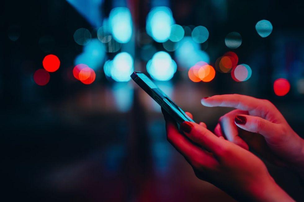 Representative Image Source: Young woman checking smartphone| Getty Images